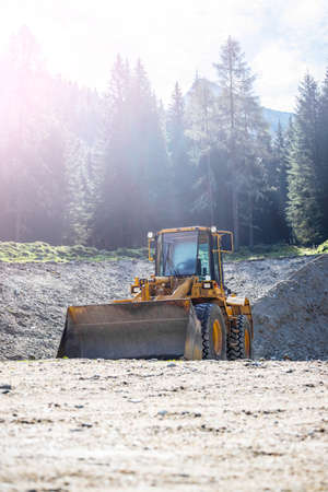 Wheel loader excavator is parking in a quarry