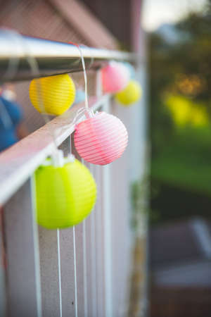 Colorful lampions outside, evening, garden partyの写真素材