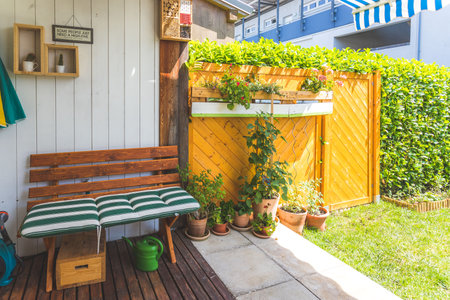 Cozy veranda with little green garden, summer timeの写真素材