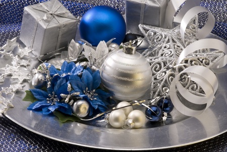 Christmas arrangement. Decorated balls and ornaments in a plate.の写真素材