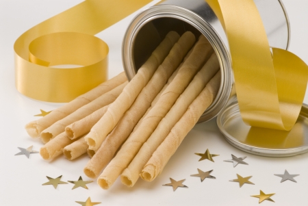 Traditional Spanish wafer rolls for Christmas named neules or barquillos 