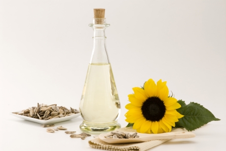Sunflower oil bottle and seeds  White background の写真素材