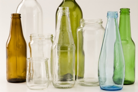 Household recycling materials. Glass bottles. White background.の写真素材
