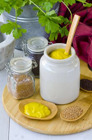 Herbs and Spices. Mustard sauce in a ceramic jar. Selective focus. Taken in daylight.の写真素材