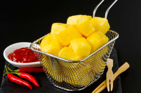 Spanish Tapas. Typical spicy fried potatoes in hot sauce. Patatas Bravas.の写真素材