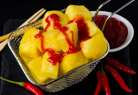 Spanish Tapas. Typical spicy fried potatoes in hot sauce. Patatas Bravas.の写真素材