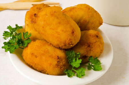 Spanish Tapas. Fried Ham Croquettes in a white bowl. Croquetas de jamon.の写真素材