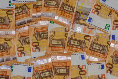 50 Euro money currency banknotes background. Money backdrop with 50 euros billsの写真素材