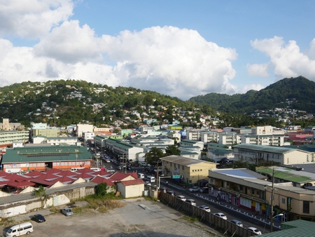 Aerial shot at the houses and buildings at the dock area at the Castries Harbor of St. Lucia in the Caribbean Islands. St. Lucia is one of the favorite stopovers for Caribbean cruise lines.の写真素材
