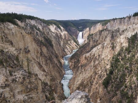 The stunning 308-foot tall Lower Falls at Yellowstone National Park.の写真素材
