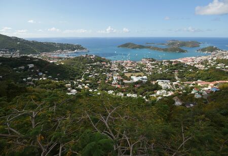Breathtaking view of St Thomas harbor and coast seen from an overlookの写真素材