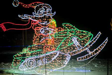 christmas decoration in the shape of snowman at night in winterの写真素材