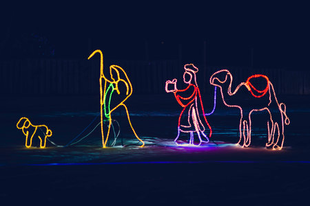 Neon illustration of a group of people walking in the night.の写真素材