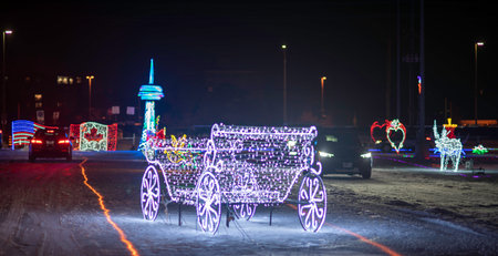 Illuminated Christmas carriage on the street at night in Moscow, Russiaの写真素材
