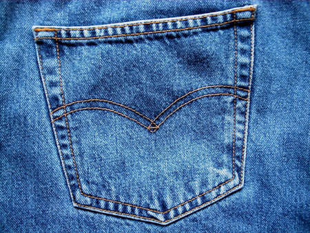 Close up of blue jeans pocket