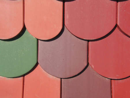 a roof with a colorful plane tiles(close up)の写真素材