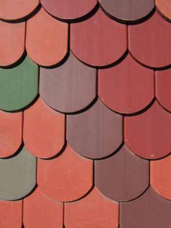 a roof with a colorful plane tilesの写真素材