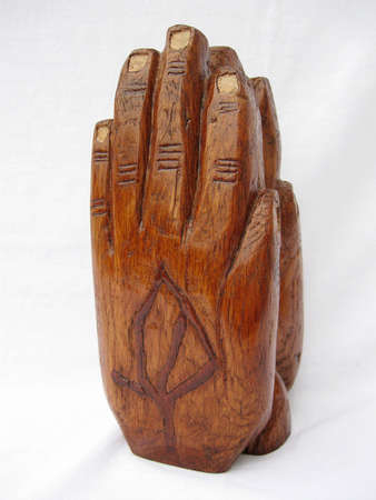 sculpture of hands prayingの写真素材