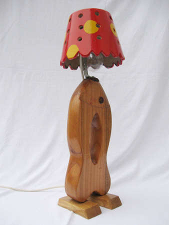 handmade wooden lamp in shape of the fishの写真素材