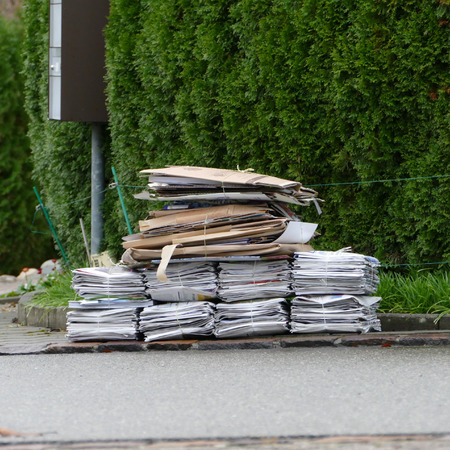 Waste cardboard and paper bundle for recycling. Stack of papers.の写真素材