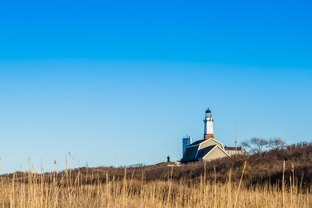 A beautiful shot of the Montauk Lighthouse on a bright sunny spring dayの写真素材