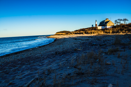 A shot of the empty beach around the Montauk lighthouse on a clear blue spring dayの写真素材