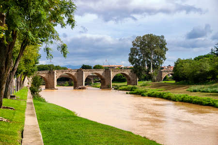 The Le Pont Vieux bridge over the Aude river in Carcassonne Franceのeditorial素材