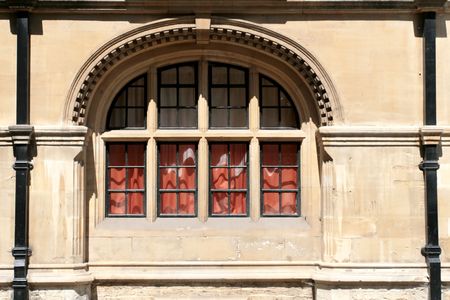 An historical window outside an old building in Oxford University, England