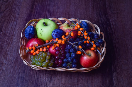 A basket full of fruit from the gardenの写真素材