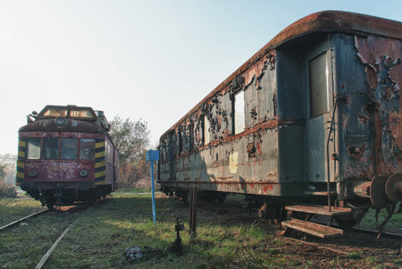 Old abandoned  trains at depot in sunny dayの写真素材