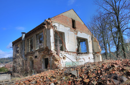 Photo from demolition  textile  factory in sunny day