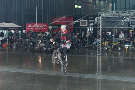 BRNO, CZECH REPUBLIC-MARCH 4,2016: Stuntman riding a bike during stunt show on International Fair for Motorcycles  on March 4,2016 in Brno in Czech Republicのeditorial素材