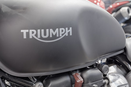 BRNO, CZECH REPUBLIC-MARCH 4,2016: Close up of inscription on fuel tank of motorcycle Triumph on International Fair for Motorcycles  on March 4,2016 in Brno in Czech Republicのeditorial素材