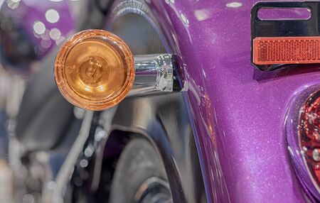 Close up of motorcycle rear light, indoor photo.の写真素材