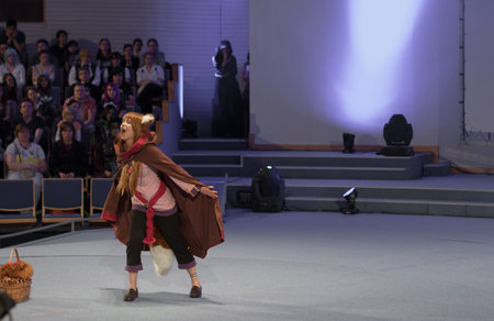 BRNO, CZECH REPUBLIC - APRIL 30, 2016: Cosplayer dressed as character Holo from Anime Spice and Wolf During cosplay contest at Animefest, anime convention on April 30, 2016 in Brno, Czech Republicのeditorial素材