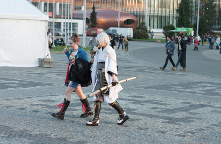 BRNO, CZECH REPUBLIC - APRIL 30, 2016: Visitors walking and drinking your drink at Animefest, anime convention on April 30, 2016 Brno, Czech Republicのeditorial素材