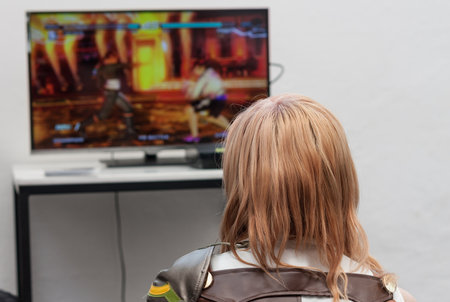 BRNO, CZECH REPUBLIC - APRIL 30, 2016: Unidentified teenagers playing console games at Animefest, anime and manga convention on April 30, 2016 Brno in the Czech Republicのeditorial素材