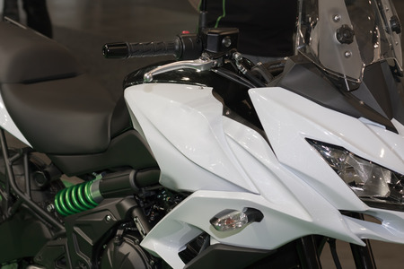 Close up of new modern motorcycle, indoor photo.