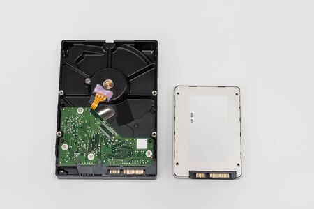 Internal desktop hard drive and solid state drive disk on white background の写真素材