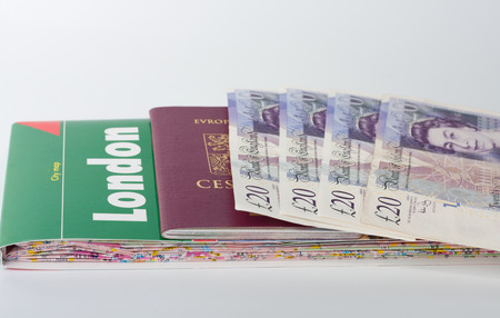 Map of London,passport and british pounds, equipment before traveling.の写真素材