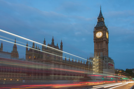 Light trails on westminster bridge, Big Ben and Palace of Westminster in the morning, London,...