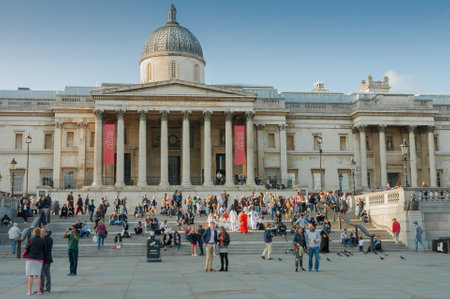 Trafalgar Square , London-September 6,2017: Tourists walking on Trafalgar Square, on background The National Gallery on September 6, 2017 in London, United Kingdomのeditorial素材