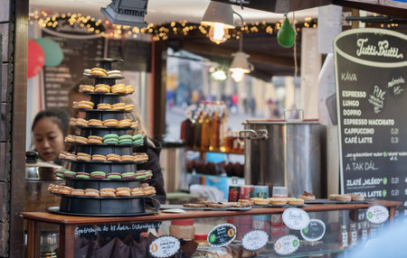 Brno,Czech Republic-December 18,2017: Woman sales candy and drinks  at Christmas market at Liberty Square on December 18, 2017 Brno, Czech Republicのeditorial素材