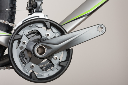 Crankset on mountain bike, studio photo, close up view. 