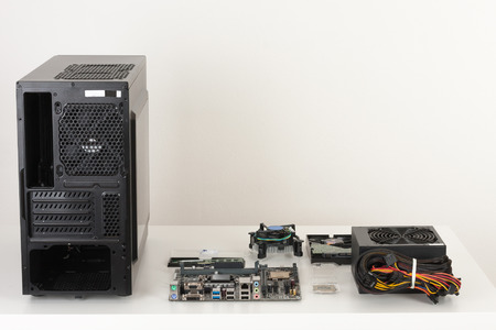 New components, hardware for building desktop PC. PC case, motherboard, processor, power supply, memory, fan, hard drive. の写真素材