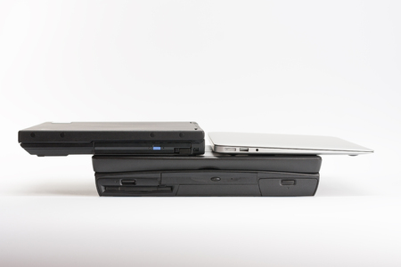 Comparing of laptops, new modern and old laptops, present and past, technology progress isolated on...
