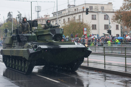 European street, Prague-October 28, 2018: Soldiers of Czech Army are riding light reconnaissance and...