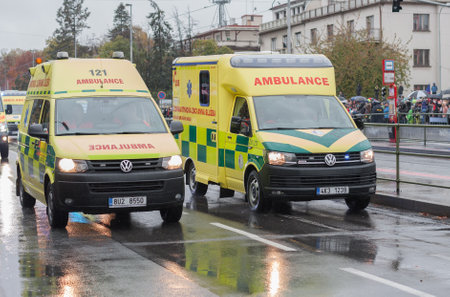 European street, Prague-October 28, 2018: Paramedics are riding ambulance on military parade on October 28, 2018 in Prague, Czech Republicのeditorial素材