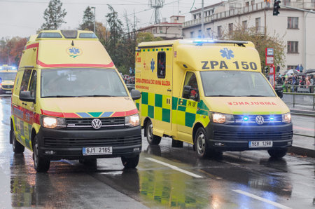 European street, Prague-October 28, 2018: Paramedics are riding ambulance on military parade on October 28, 2018 in Prague, Czech Republicのeditorial素材