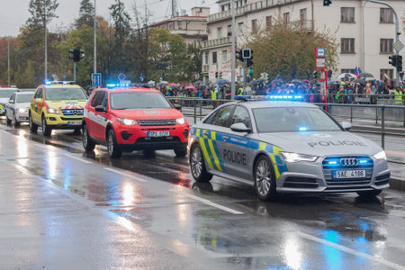 European street, Prague-October 28, 2018: Police workers and Fire brigade workers riding cars on military parade on October 28, 2018 in Prague, Czech Republicのeditorial素材